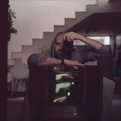Juan Manuel Cornejo with a camera