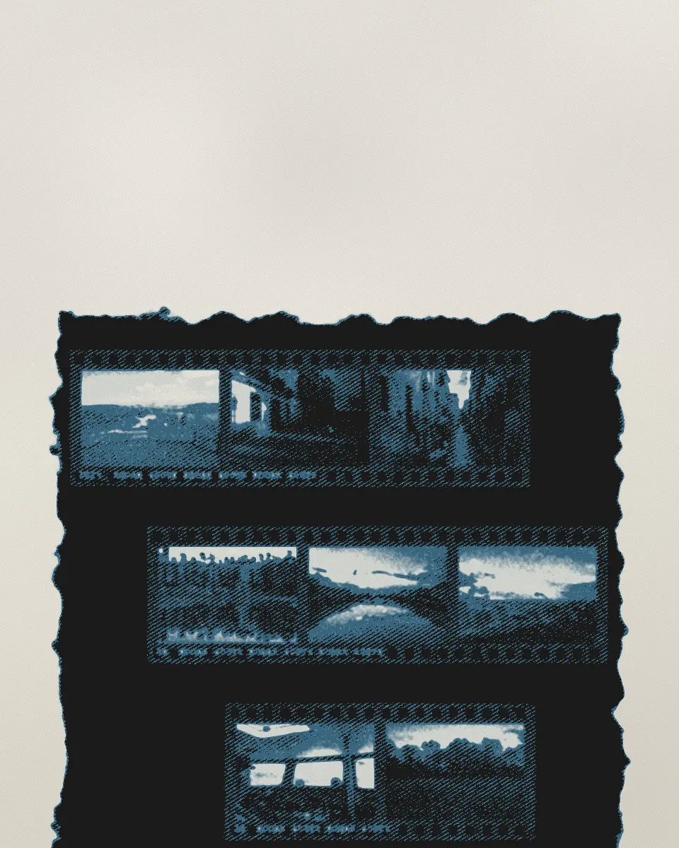 A cyanotype of strips of film negatives laid on blue paper, the brushed edge of the coating round them.