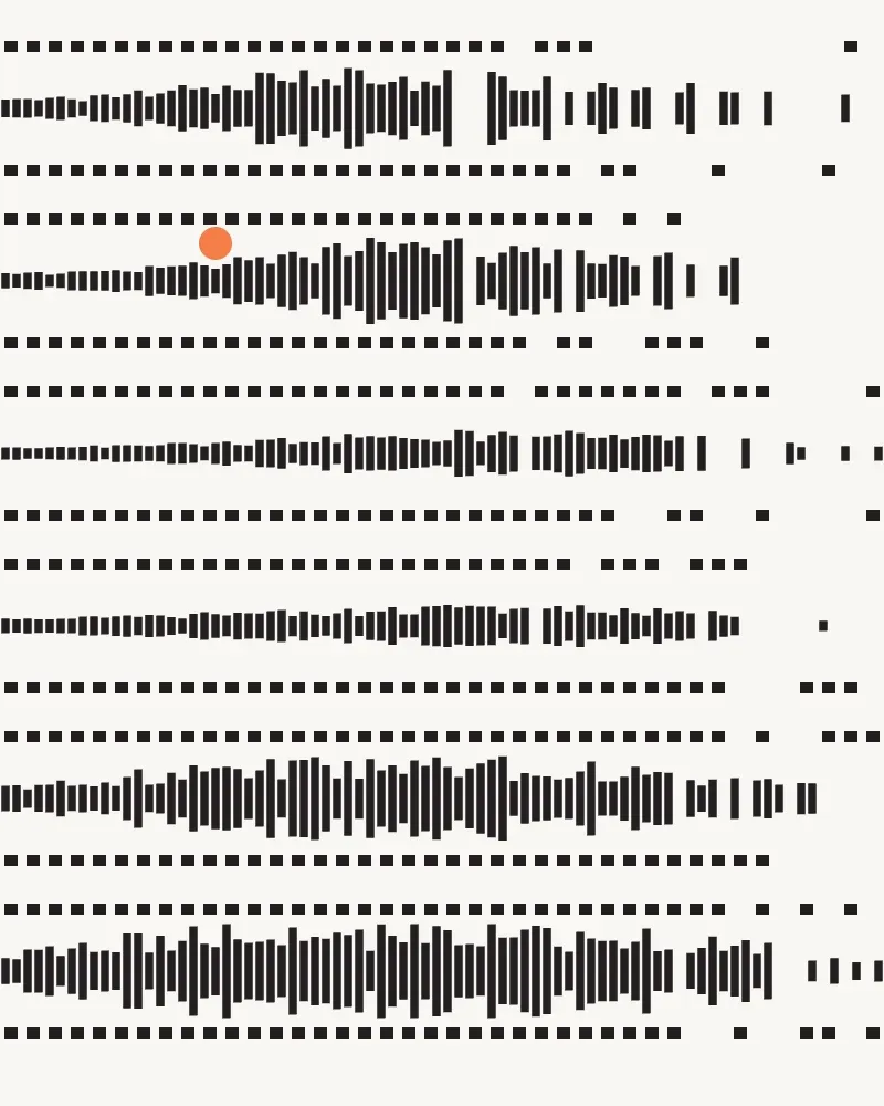 A plate of film strips and a mirrored waveform on paper, with an orange dot.