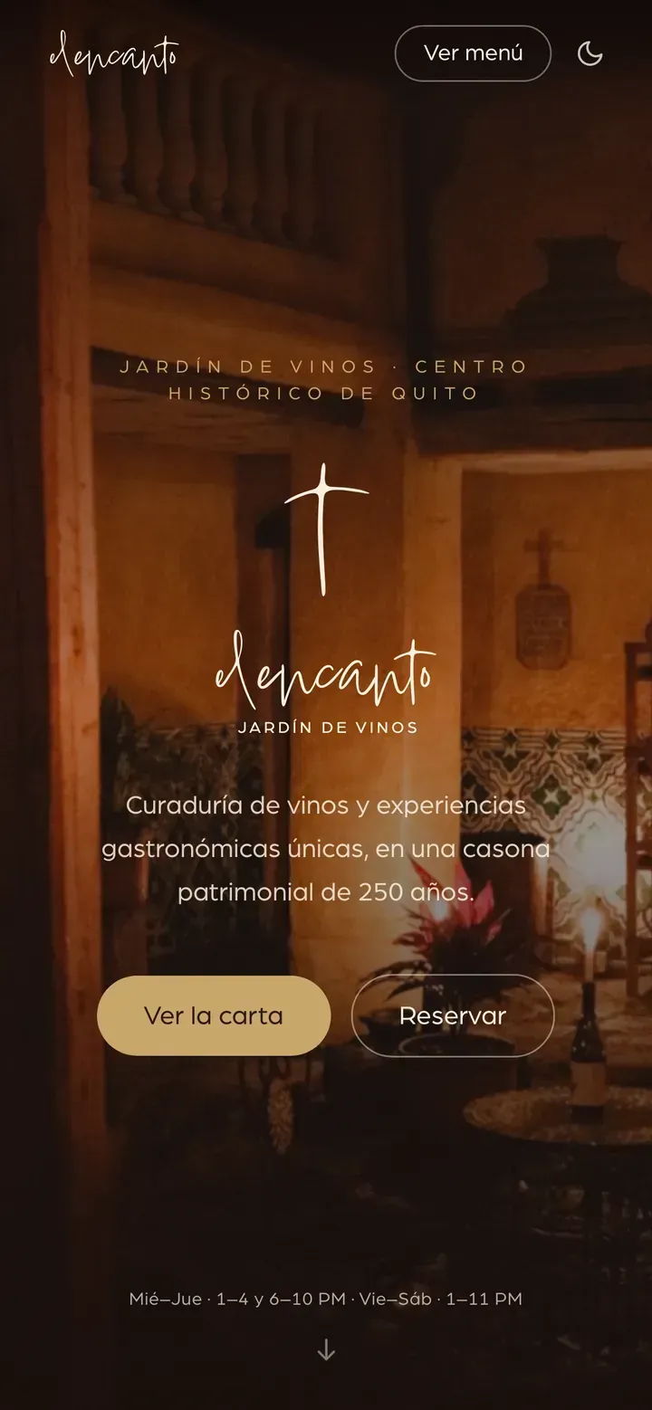 El Encanto’s site on a phone: a courtyard photograph under a dark wash, the wordmark, one line of copy, a gold and an outlined button, opening hours and a down arrow.