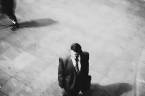Centro Histórico, Quito, 2025. A man in a suit, seen from above.