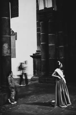 Centro Histórico, Quito, 2025. A woman in a long dress under the arcades.