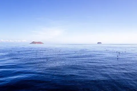 Galápagos, 2024. Two islands on the open sea.