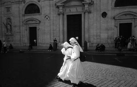 Rome, 2022. Two nuns crossing the piazza.